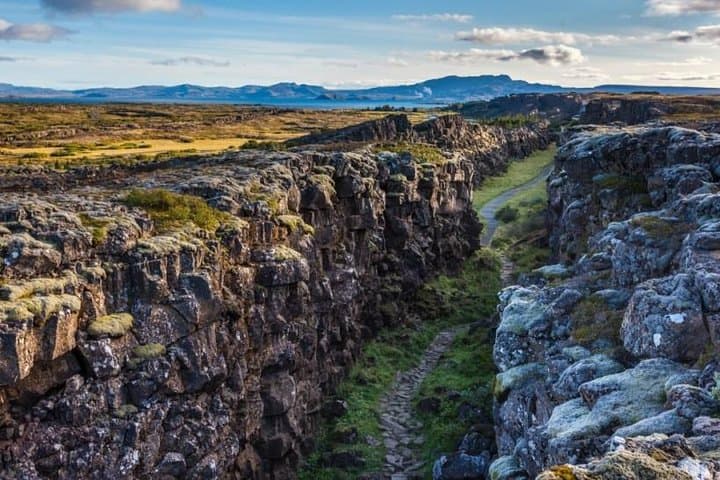 Þingvellir (Thingvellir) is a historic site and national park in Iceland, east of Reykjavík. It's known for the Alþing (Althing), the site of Iceland's parliament from the 10th to 18th centuries.