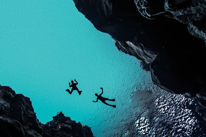 Silfra Wetsuit Snorkeling Tour with Underwater Photos - From Reykjavik