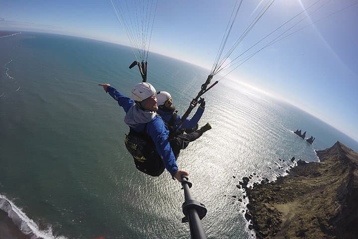 Flying above the ocean in Vík.