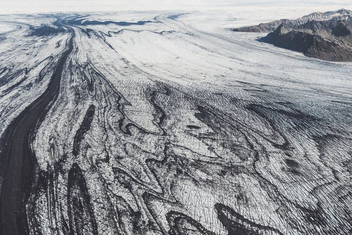 Airplane tour over black sands and riverbeds from Skaftafell