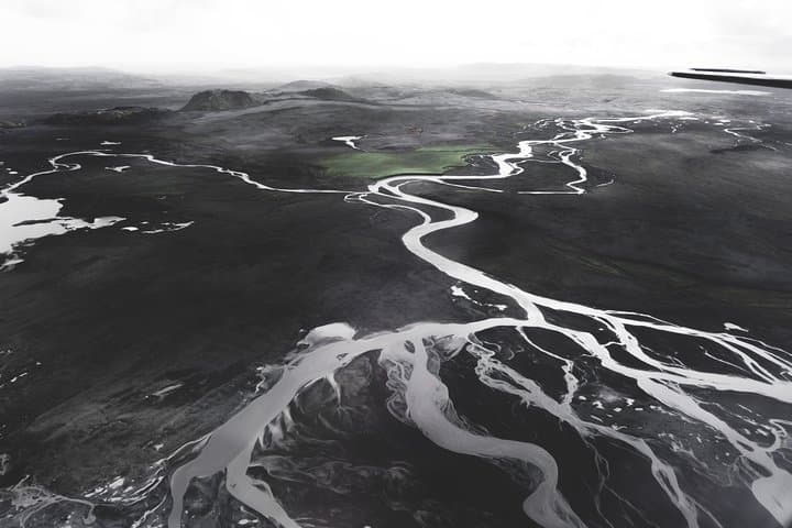 Airplane tour over black sands and riverbeds from Skaftafell