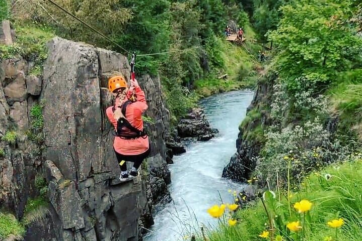 On the first zipline of 5 on our tour you dive straight into the canyon and glide over to the bank on the other side.