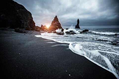 Reynisfjara, the Black Beach, is a truly unique spectacle of nature. These rocks are called the "Troll Toes"