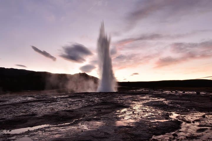 Geyser Strokkur in Midnight Sun Light