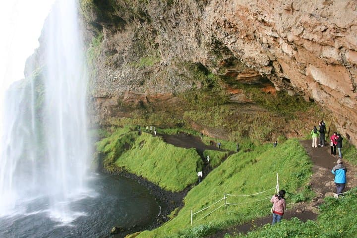 Walking behind a waterfall