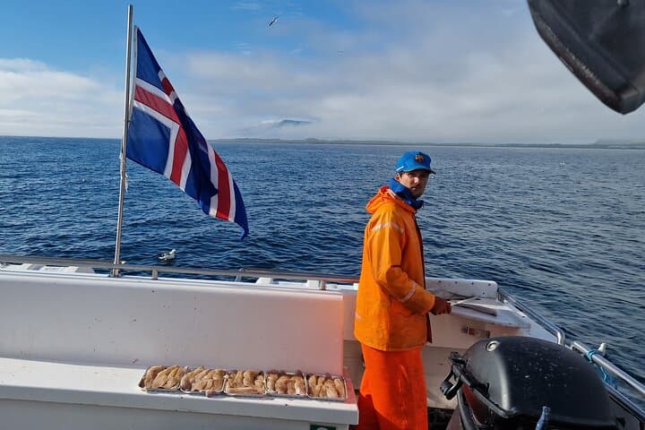 Preparing the fish for cooking.
