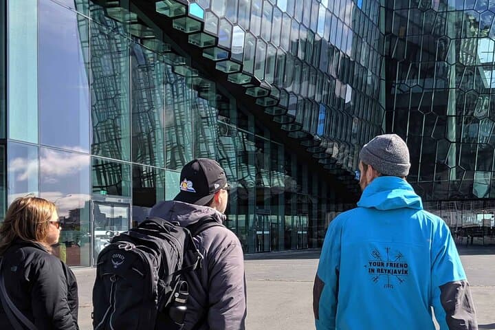 Our guide explaining the history and architecture of the Harpa Concert Hall in Reykjavik
