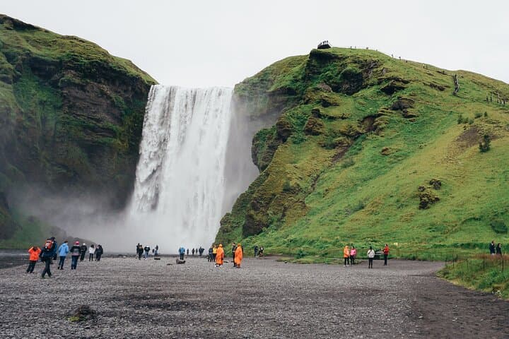 The basin of Skogafoss, we recommend waterproof clothing if you want to explore this area :)