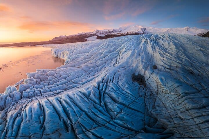 An aerial view shows the rugged, icy surface of a glacier in Skaftafell.