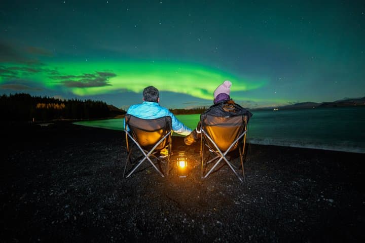 Northern Lights Small-Group Tour with Photos, Snacks & Snowsuits