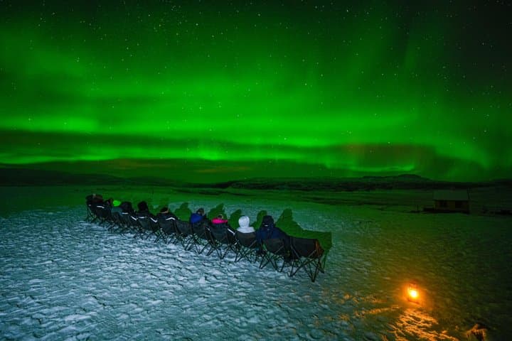 Northern Lights Small-Group Tour with Photos, Snacks & Snowsuits